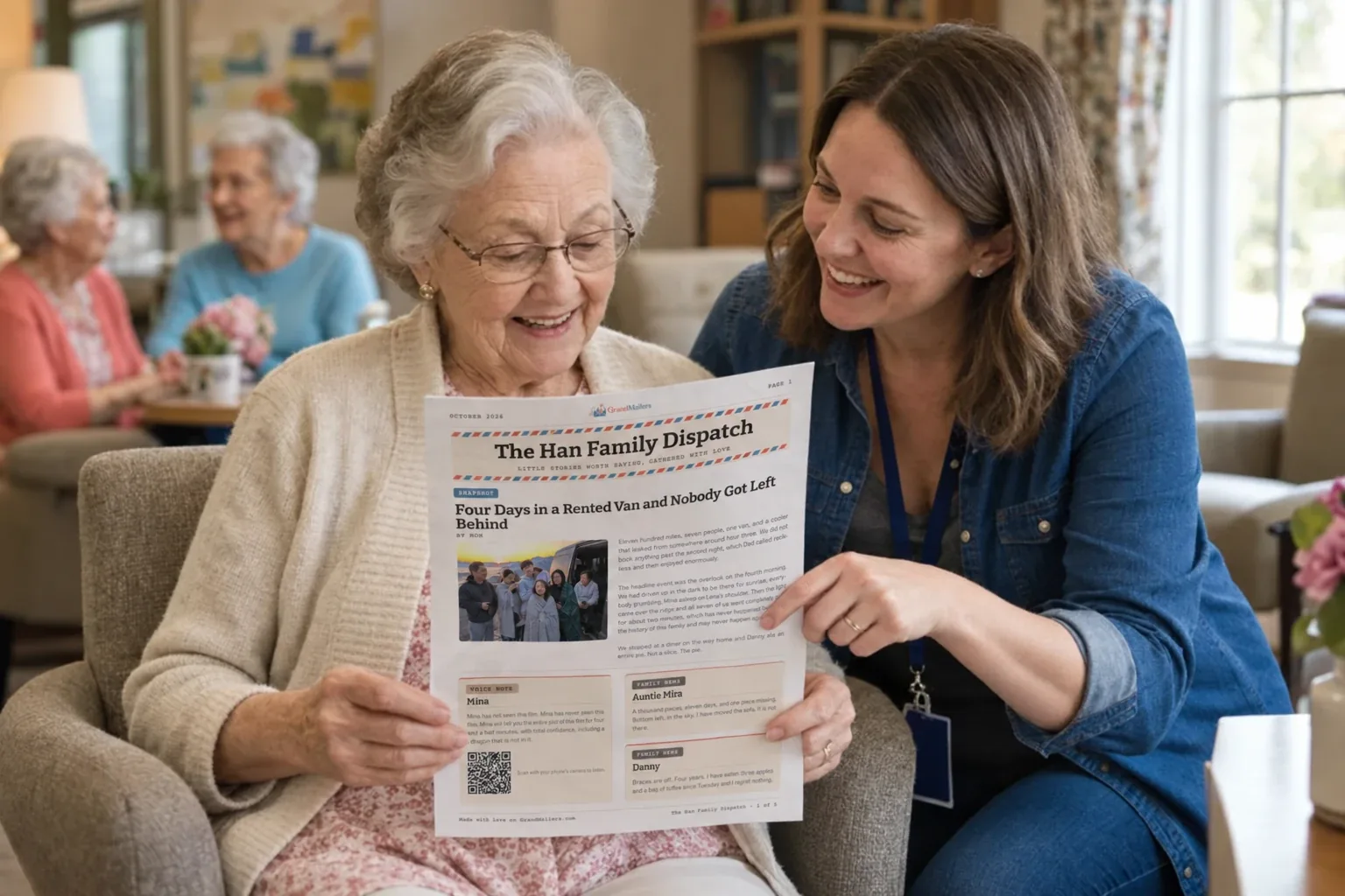 A smiling resident in her community lounge reading her printed family newsletter while the activity director points out a photo